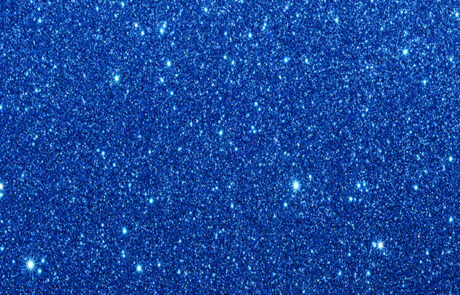 “Pixie Dust” blue sparkle backdrop with shimmering tones, available for events from Dramatic Dimensions Entertainment in Garden City, Metro Detroit, and Southeast Michigan